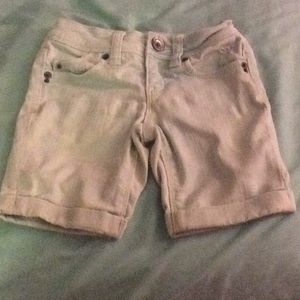 Light blue jean shorts.
